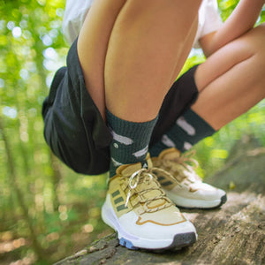 Schaf Merino Wandersocken mit Frotteesohle, grün mit Schafmotiven, ideal für Wandertouren und Komfort.