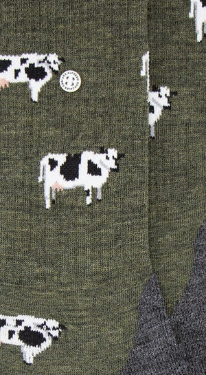 Kuh Merino Wandersocken mit Frotteesohle, bestehend aus hochwertiger Merinowolle und einzigartigem Kuhmuster.